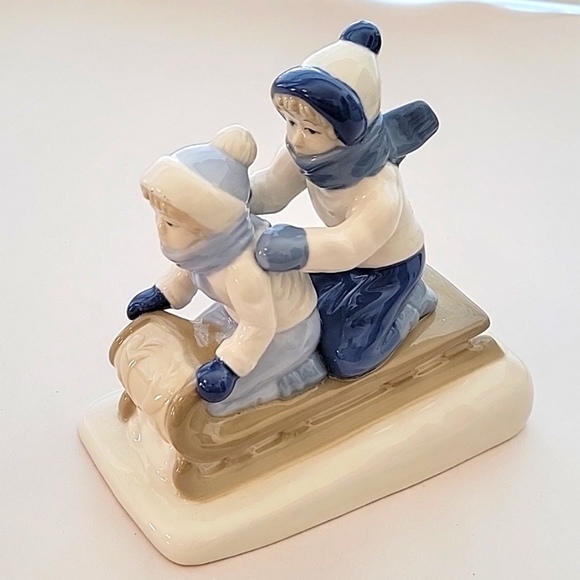 Vintage 1992 Children Sled Riding Porcelain Figurine Made in Mexico - Picture 1 of 7